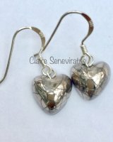 Heart earrings with silver lustre.