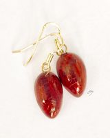 Red teardrop ceramic earrings with crackle glaze.