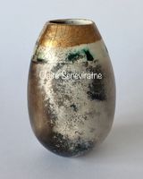Smoke fired pot with gold lustre.