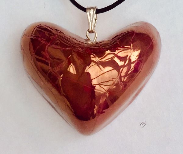 Red heart pendant.