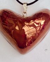 Red heart pendant.