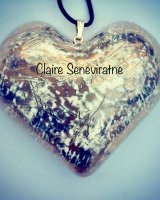 Large Gold and platinum heart pendant.