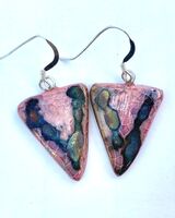 Pink triangle drop earrings with iridescent colours.