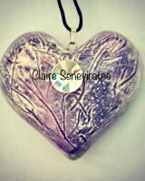 Large purple heart pendant.