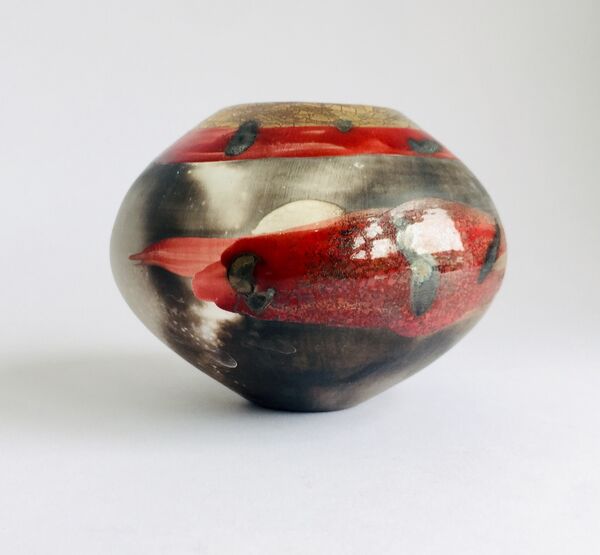 'Sunrise' Red smoke-fired pot.