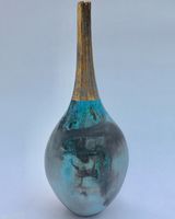 Blue smoke-fired pot with gestural markings crackled glaze and gold lustre.