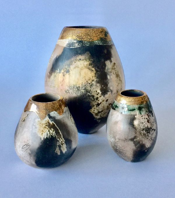 Group of 3 smoke fired pots.