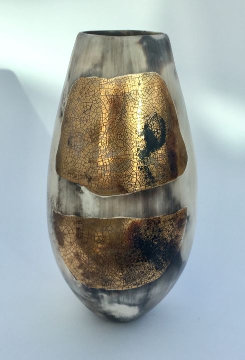 Large smoke-fired ceramic pot with gold gold lustre.