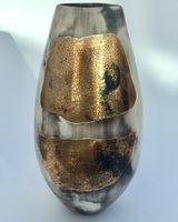 Large smoke-fired ceramic pot with gold gold lustre.