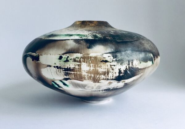 Large natural porcelain smoke-fired pot.