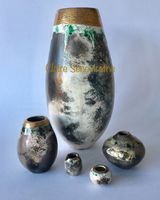 Group of smoke fired pots.