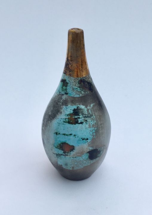 Small blue smoke-fired ceramic pot with gold lustre.