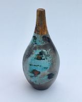Small blue smoke-fired ceramic pot with gold lustre.