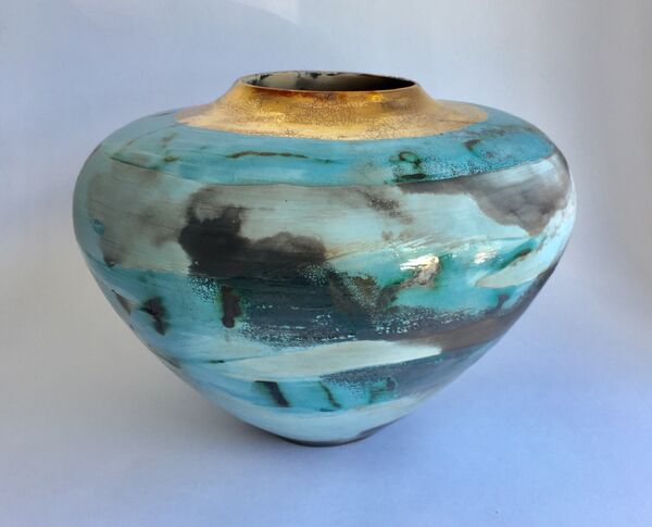 Large blue smoke-fired pot.