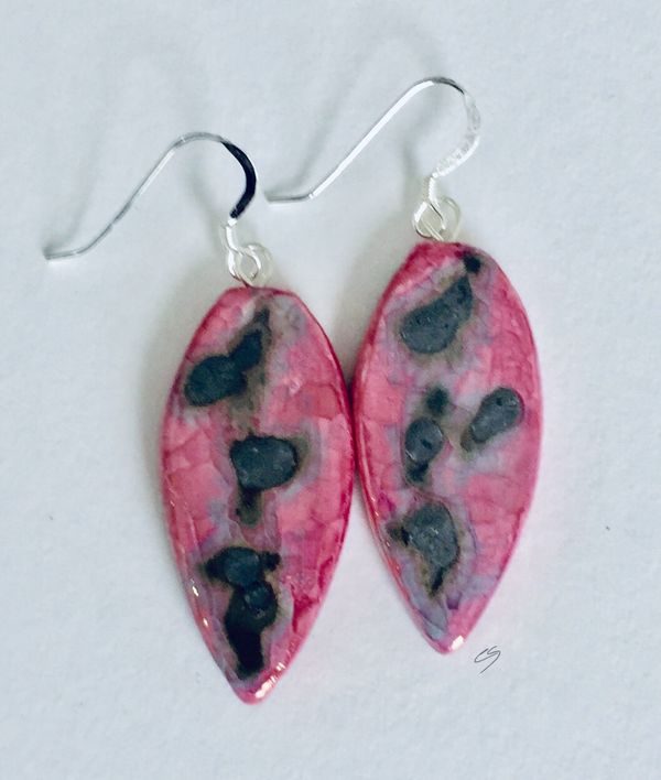 Pink leaf shaped drop ceramic earrings with silver grey abstract markings.