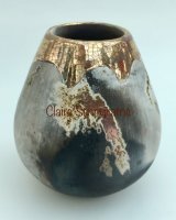 Small ceramic smoke fired pot with gold and copper.