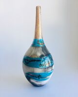 Blue smoke-fired pot with gestural markings crackled glaze and gold lustre.