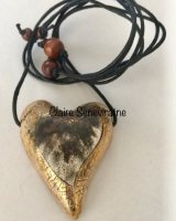Smoke fired heart pendant.