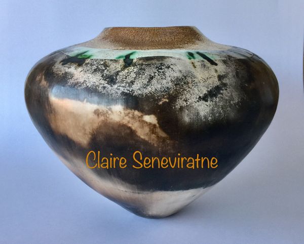 Large smoke fired pot.