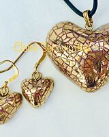 Gold heart jewellery set.
