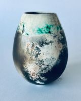 Smoke fired pot with copper carbonate.