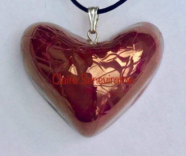 Red heart pendant.