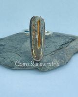 Silver porcelain ring with gold.
