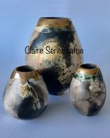 Group of 3 smoke fired pots.