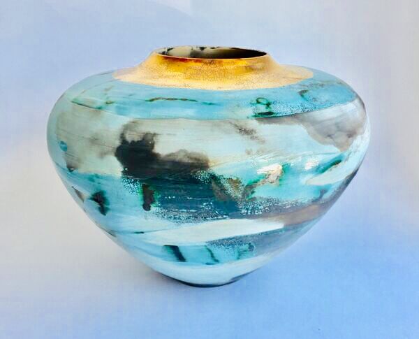 Large blue smoke-fired pot.