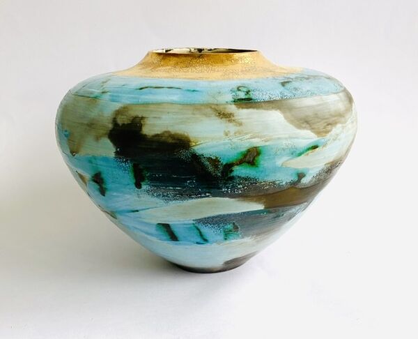Large blue smoke-fired pot.