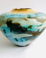 Large blue smoke-fired pot.