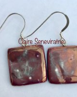 Square purple earrings.