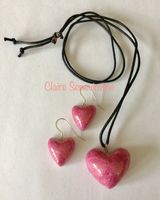Pink heart pendant and earring set.