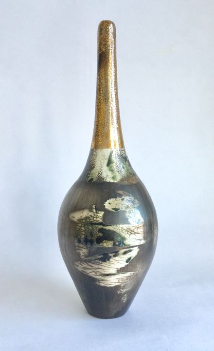 Burnished smoke-fired ceramic pot with gold lustre.