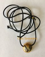 Raku style ceramic pendant.