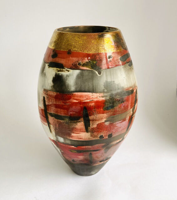 Large red sawdust fired vessel.