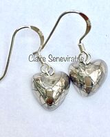Heart earrings with silver lustre.