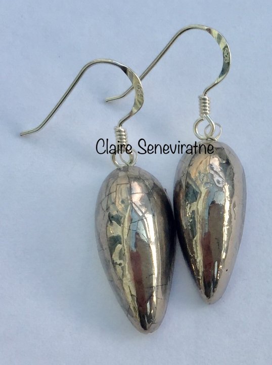 Silver teardrop earrings.