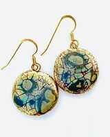 Round ceramic earrings with glaze and gold lustre.