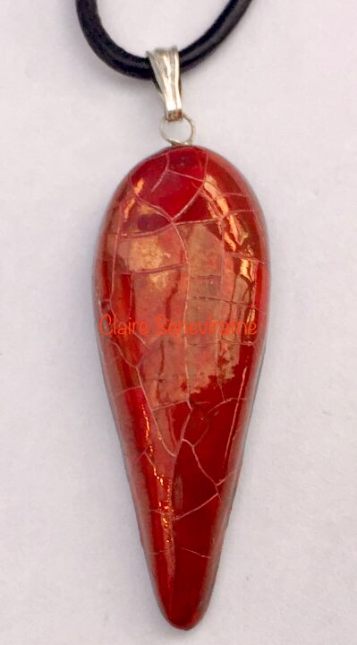 Red teardrop pendant.