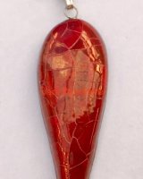 Red teardrop pendant.