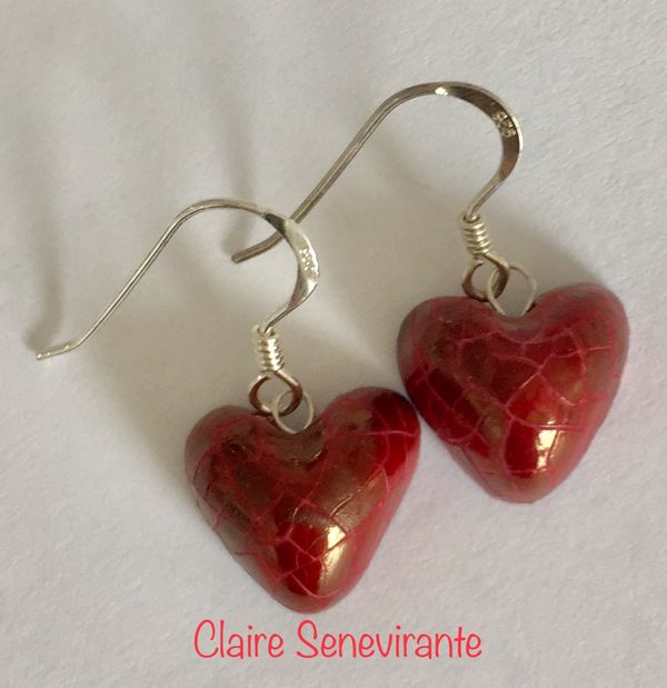 Red lustre heart drop earrings.
