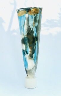 Large blue smoke-fired pot on stand with gold lustre.