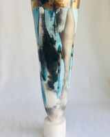 Large blue smoke-fired pot on stand with gold lustre.