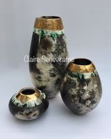 Group of 3 smoke fired pots.