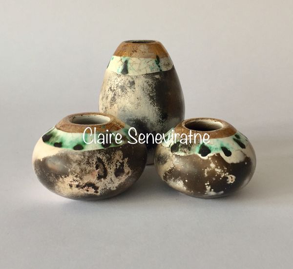 Collection of small pots.