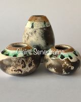 Collection of small pots.