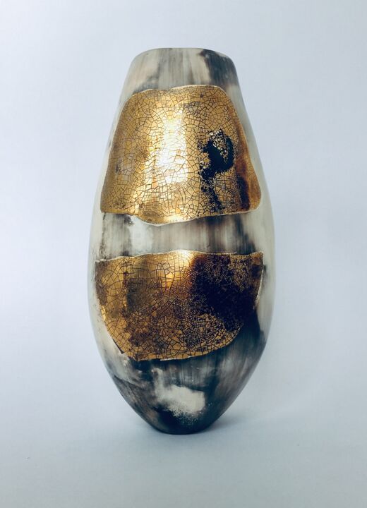 Large smoke-fired ceramic pot with gold lustre.
