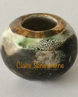 Tiny smoke fired pot.
