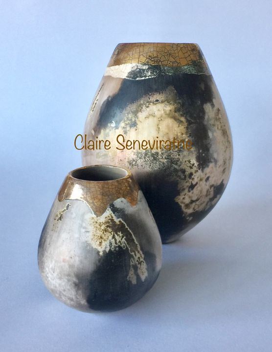 Group of 2 smoke fired pots.